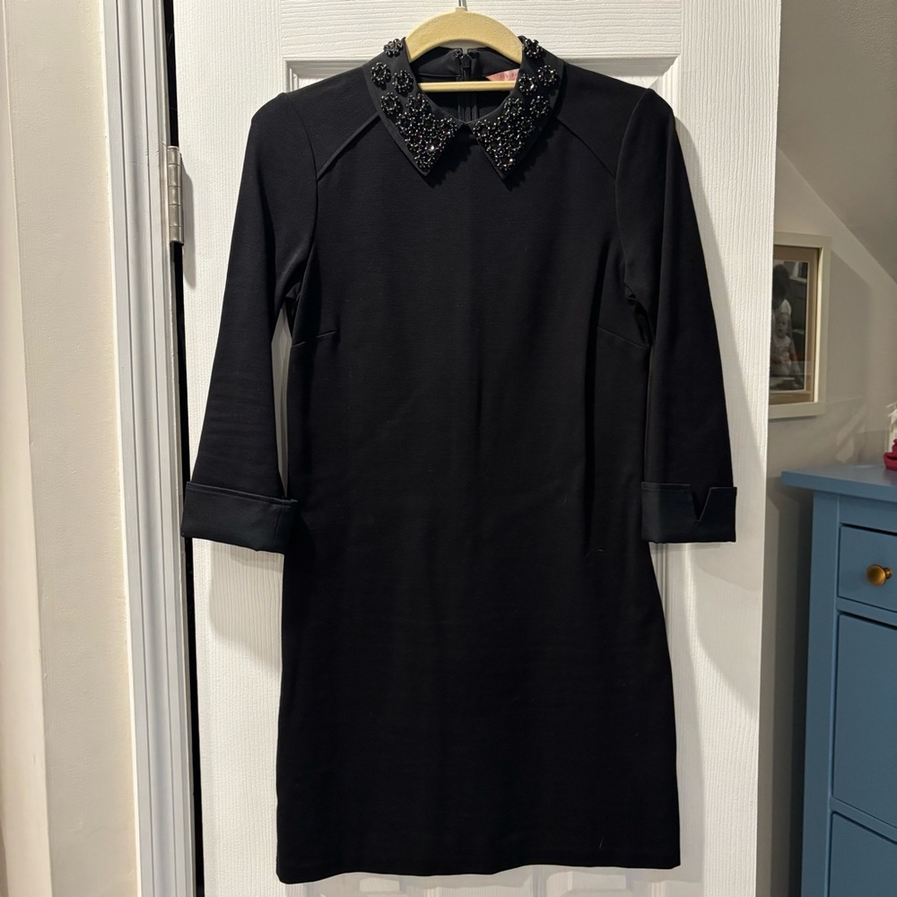 Elegant Black Dress with Embellished Collar